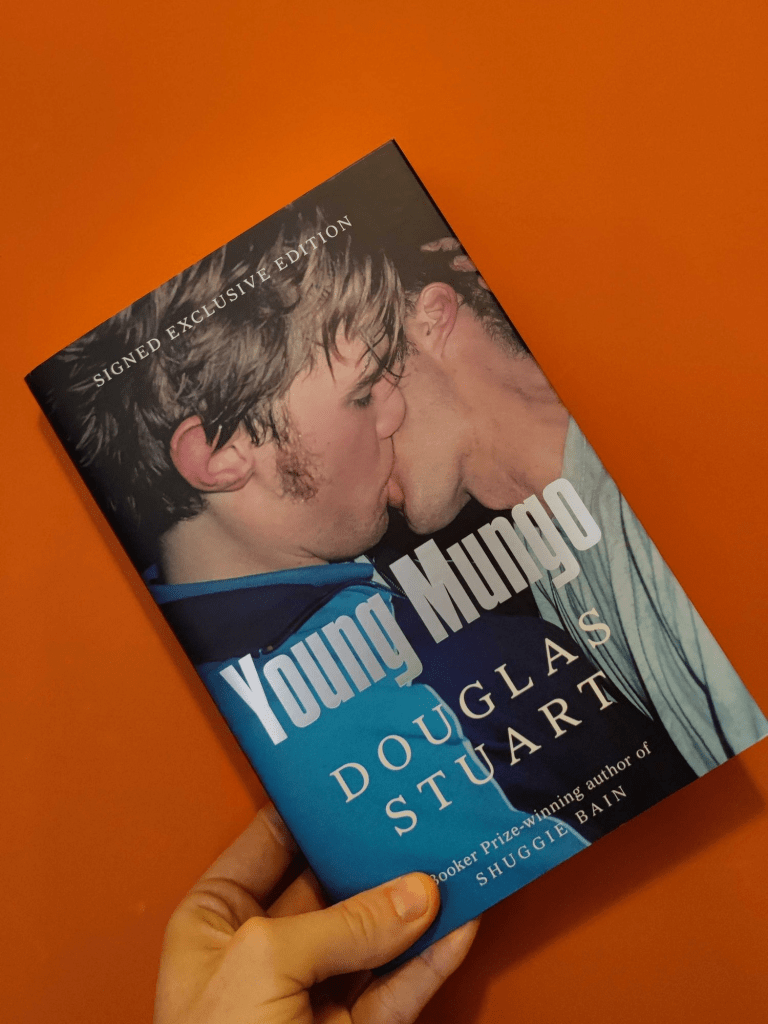 Young Mungo book cover, featuring two young men kissing in a nightclub / bar.